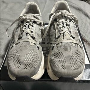 On Running Gray and White Athletic Shoes with Cushioned Midsole